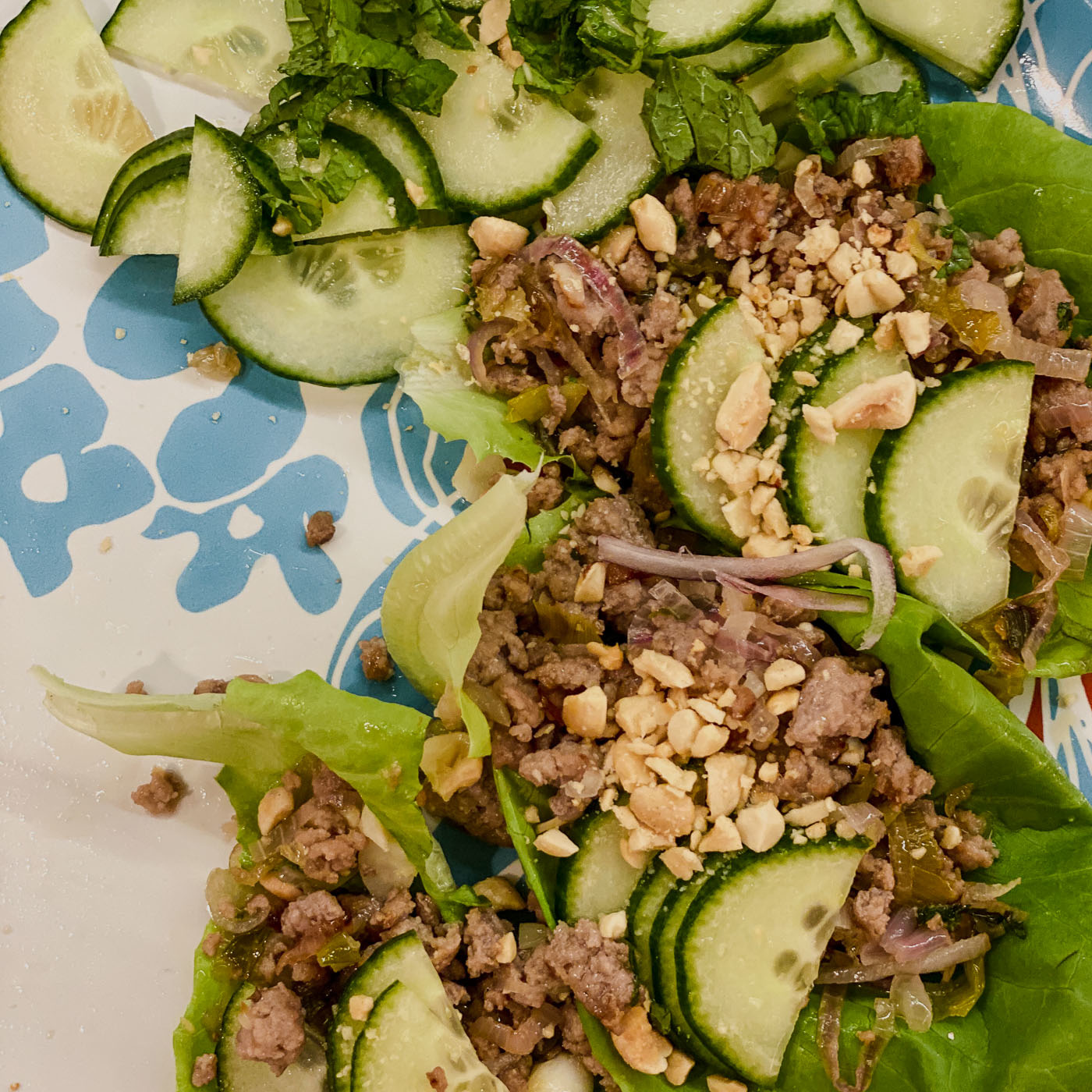 This quick fix for thai-ish slash Vietnamese flavors is perfect for a summer light meal. Its all about the balance of the intense larb's fragrance combined with naked cucumbers, buttercup lettuce wraps and herbs. Make a dipping sauce and drizzle with sesame oil.