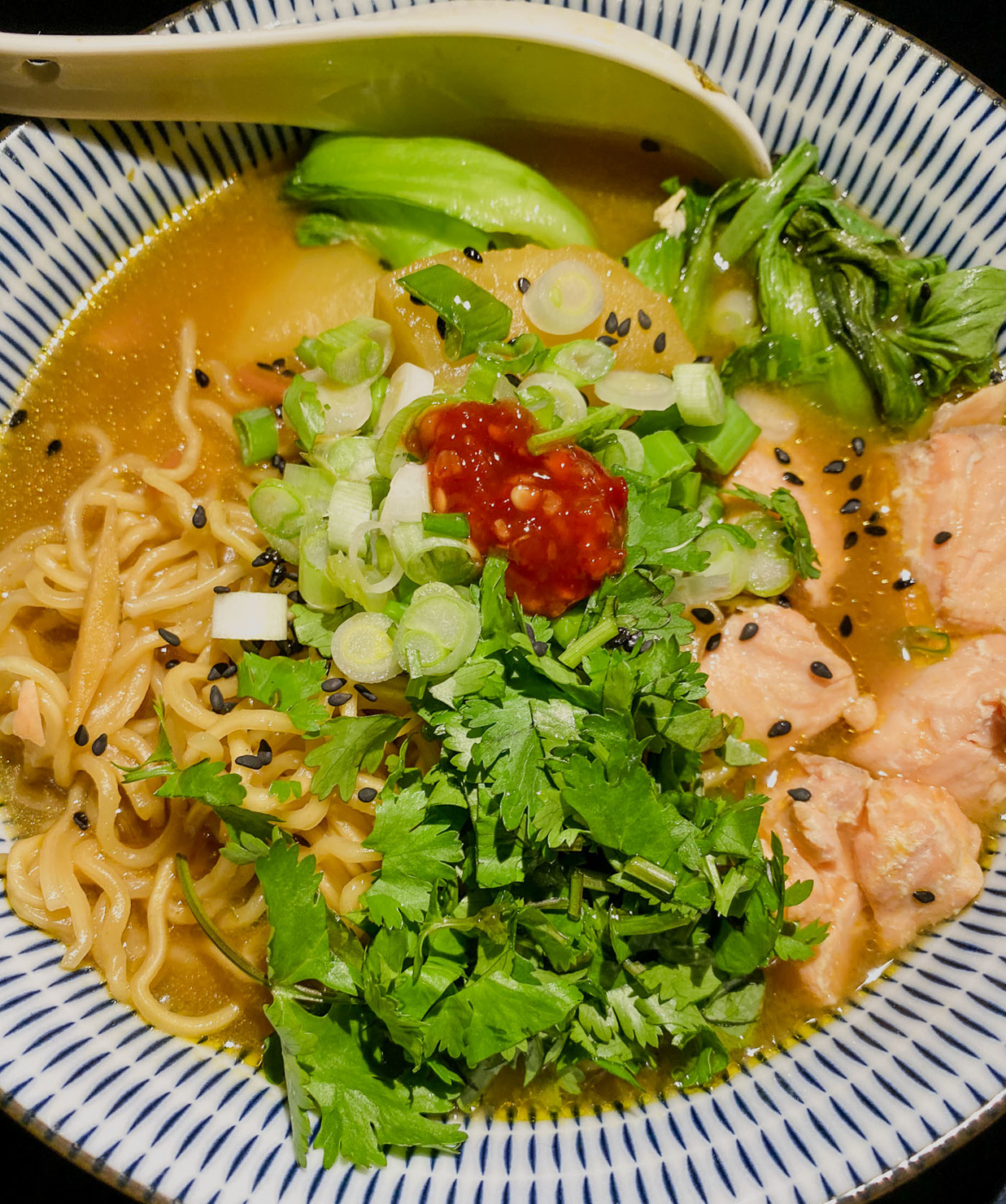 I like to add all kind of stuff in my ramen. Here's a new spin with salmon, potatoes and arugula.