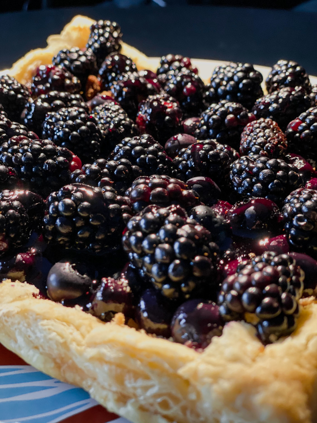 A light, thin crust tart made of homemade fillo dough and pretty much just fruits. Oh of course and ... B.U.T.T.E.R